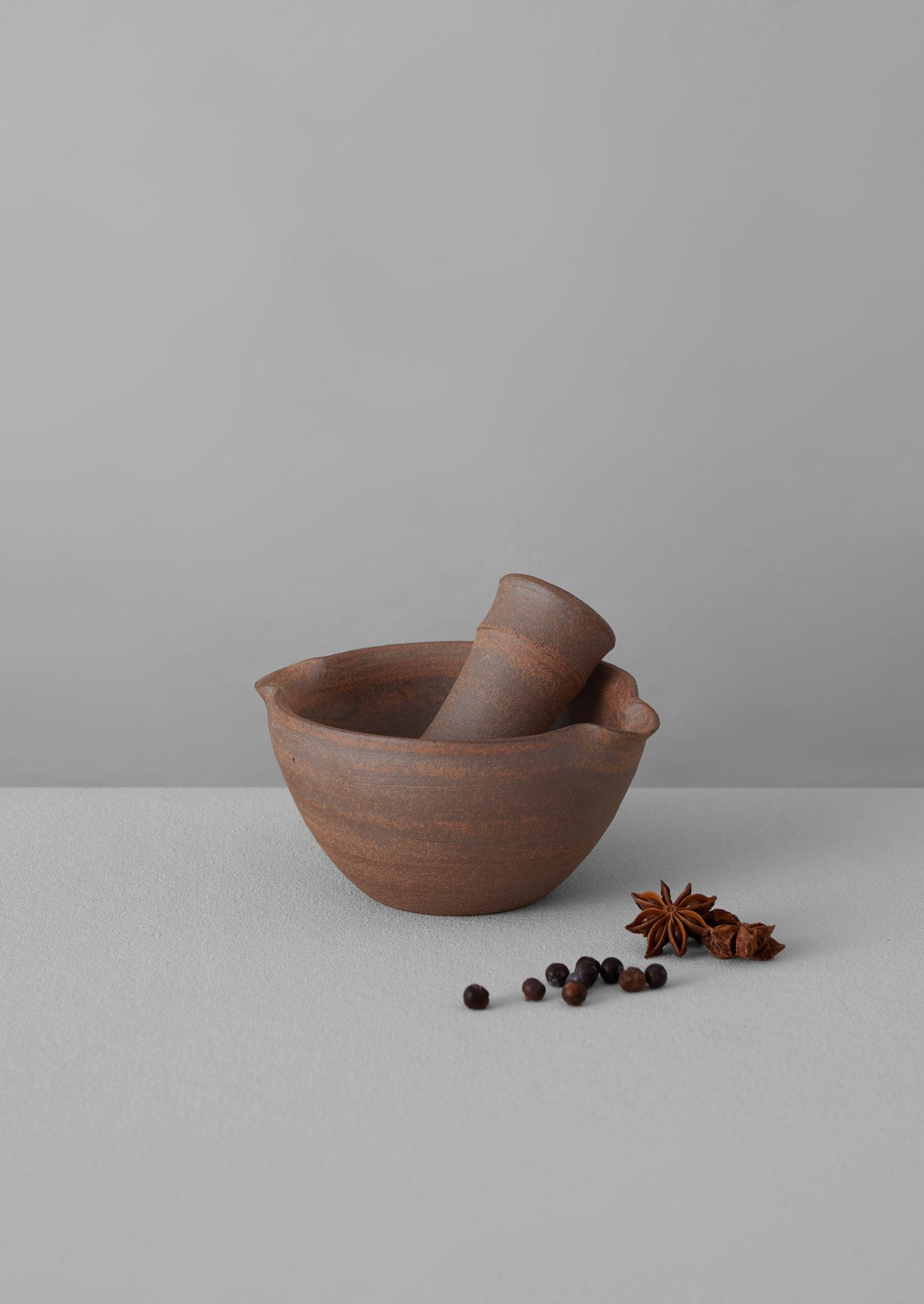 Jynsym Ong Pestle and Mortar | Red Clay